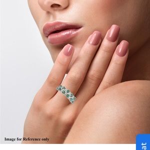 AAA green Zambian emerald with white Zircon .Rhodium over sterling silver.